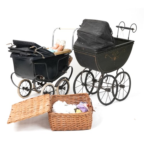 1500 - Two Victorian child's dolls prams and two composite dolls, the largest 84cm high