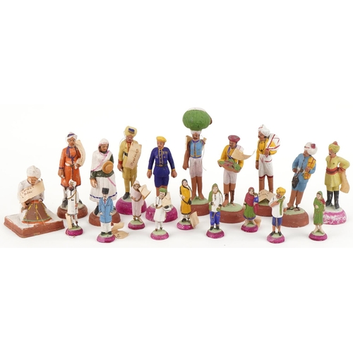 392 - Vintage Indian hand painted plaster figures including a tailor, postman, street seller tailor and gl... 