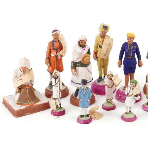 392 - Vintage Indian hand painted plaster figures including a tailor, postman, street seller tailor and gl... 