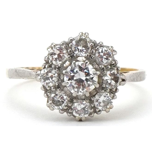 2056 - 18ct gold and platinum diamond cluster ring, the central diamond approximately 0.32 carat, each oute... 