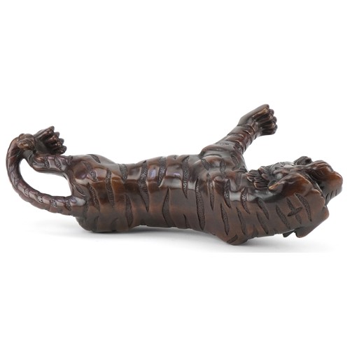 1330 - Japanese patinated bronze okimono of a tiger, 34cm in length