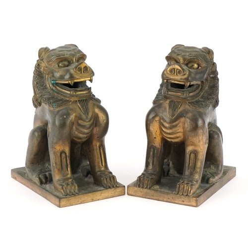 Pair of heavy Oriental Buddhist bronze altar lions, each 18cm high