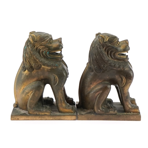 80 - Pair of heavy Oriental Buddhist bronze altar lions, each 18cm high