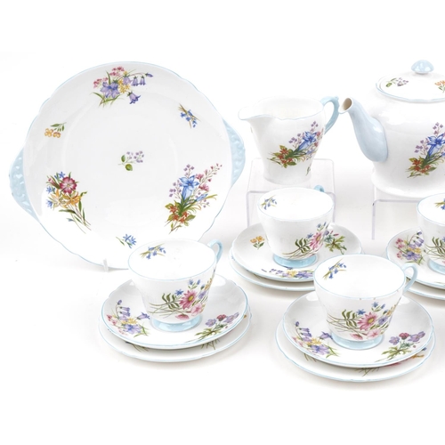 25 - Shelley porcelain Wild Flowers teawares including teapot, the teapot 14cm high