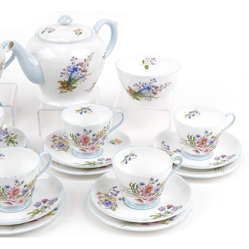 25 - Shelley porcelain Wild Flowers teawares including teapot, the teapot 14cm high