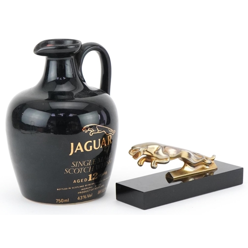 1467 - Jaguar car desk paperweight together with a sealed bottle of Jaguar Single Malt Scotch whisky, Aged ... 