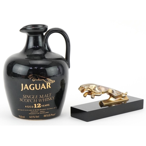 1467 - Jaguar car desk paperweight together with a sealed bottle of Jaguar Single Malt Scotch whisky, Aged ... 