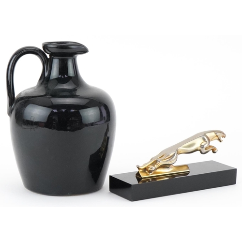 1467 - Jaguar car desk paperweight together with a sealed bottle of Jaguar Single Malt Scotch whisky, Aged ... 