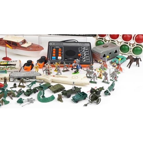 575 - Vintage and later toys, some with boxes including Dinky diecast army vehicles,  Binatone TV Master, ... 