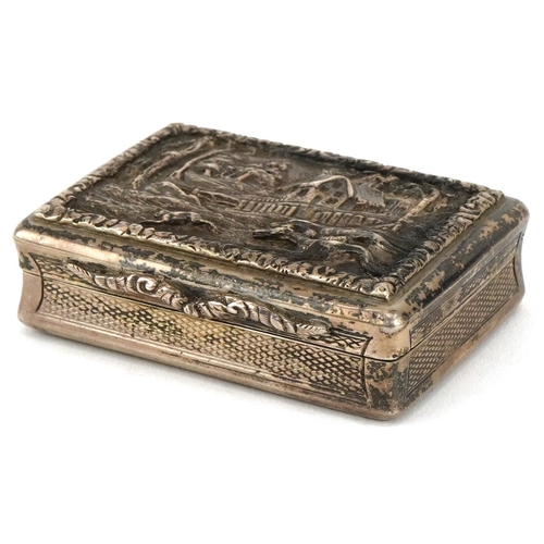 G R Collis & Co, Victorian silver snuff box, the hinged lid embossed with hunting dogs chasing a rabbit before a cottage, Birmingham 1875, 6cm wide, 75.0g