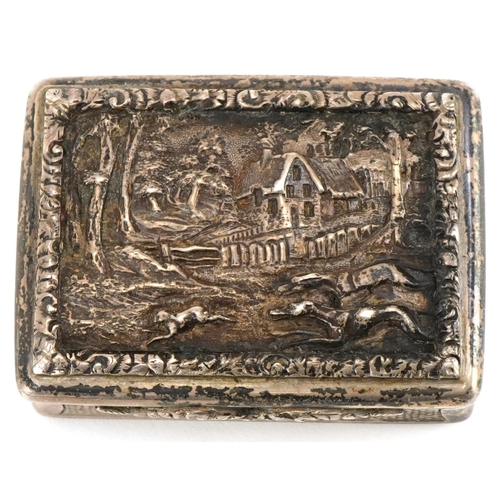 2451 - G R Collis & Co, Victorian silver snuff box, the hinged lid embossed with hunting dogs chasing a rab... 