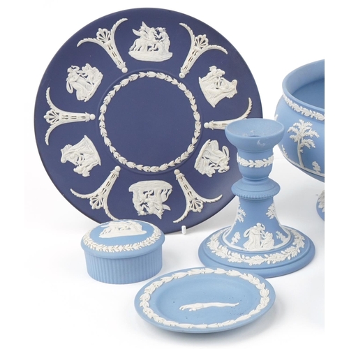 1060 - Wedgwood Jasperware porcelain including pedestal fruit bowl, candlestick, jug and boxes with covers,... 