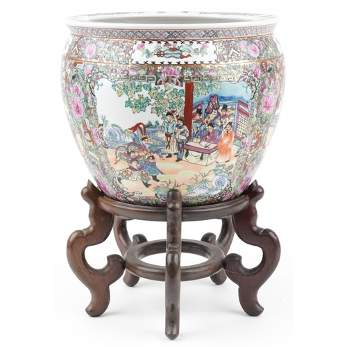 344 - Large Chinese porcelain fish bowl jardiniere hand painted with flowers and courtiers, on a hardwood ... 