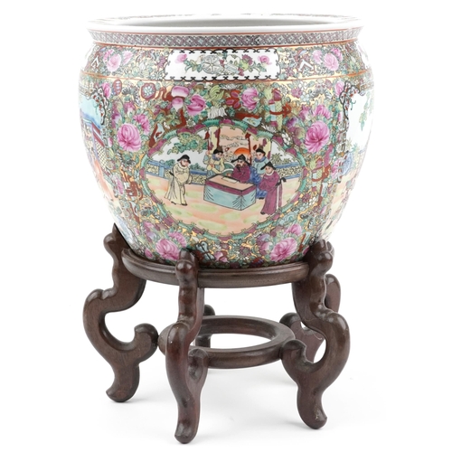 344 - Large Chinese porcelain fish bowl jardiniere hand painted with flowers and courtiers, on a hardwood ... 