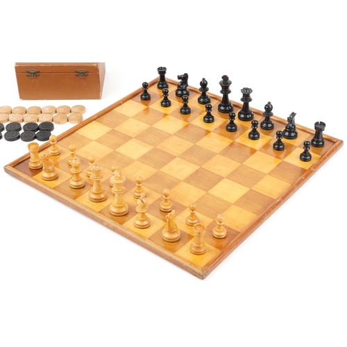 548 - Vintage boxed wooden chess and draughts set along with a wooden inlaid chessboard, the chess board  ... 