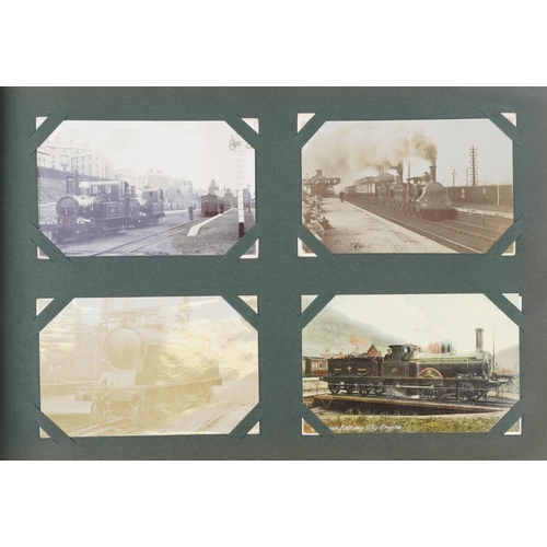 1316 - Railway postcards album with black and white photograph examples of trains including The Black Princ... 