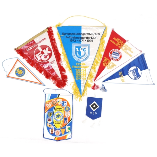 1432 - Seven football interest German match pennants including Bayern Munich and Lokomotive Leipzig and pin... 