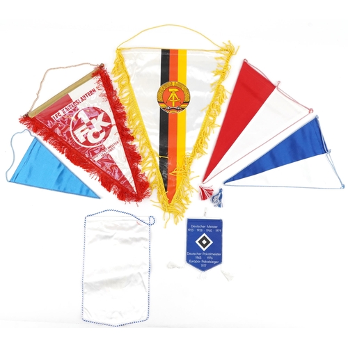 1432 - Seven football interest German match pennants including Bayern Munich and Lokomotive Leipzig and pin... 