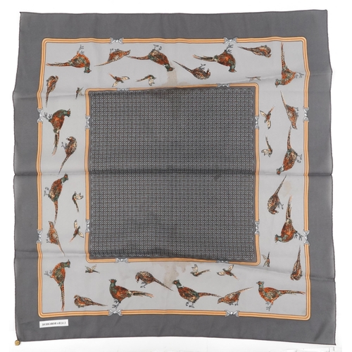 408 - Four ladies silk scarves including Hermes and Banvard & James, the largest 89cm x 86cm