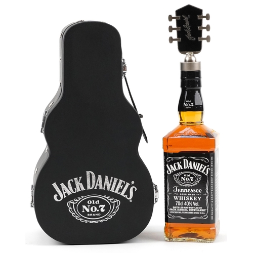 371 - 70cl bottle of Jack Daniels whisky housed in a Music to Our Ears case in the form of a guitar, 31cm ... 