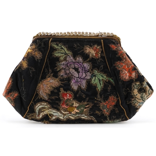 413 - Chinese silk clutch bag embroidered with a figure amongst flowers, 24cm wide