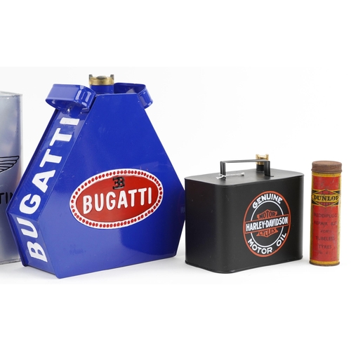 1180 - Four advertising fuel cans together with AA leather case with first aid kit and Dunlop repair kit