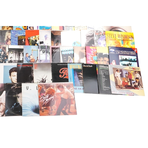 517 - Large collection of vinyl LP records including Marilyn Martin, Miami Vice, ABBA, Rick Astley, Whitne... 