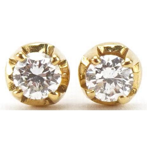 Pair of 18ct gold diamond solitaire stud earrings, each approximately 3.10mm in diameter, total 1.2g