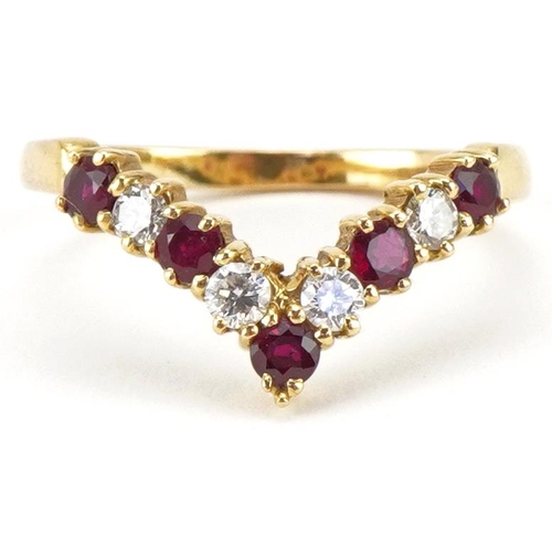 18ct gold diamond and ruby wishbone ring, the larger diamonds each approximately 2.30mm in diameter, size P, 3.6g