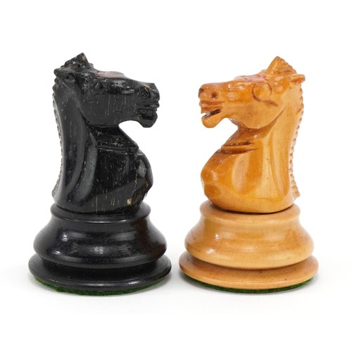 1502 - Boxwood and ebony Staunton pattern chess set, the largest piece 7.5cms tall