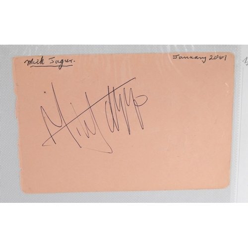 1320 - Album of approximately ninety autographs on single sheets including musical stars Cilla black, Mick ... 