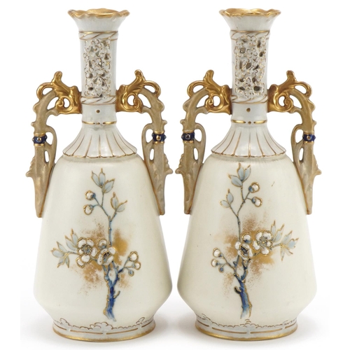 198 - Pair of Royal Vienna porcelain vases with pierced necks, hand painted, enamelled and gilded with flo... 