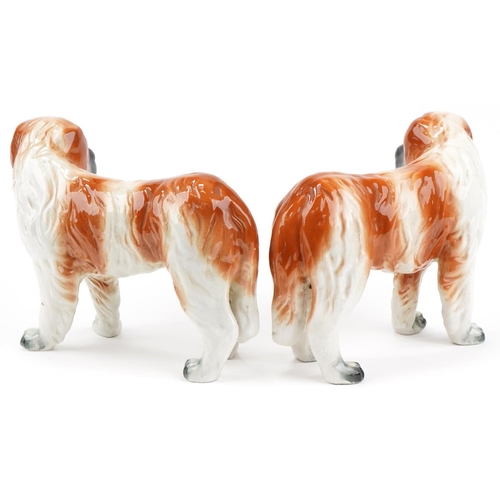 188 - Pair of Victorian Staffordshire St Bernard dogs, each 26cm high