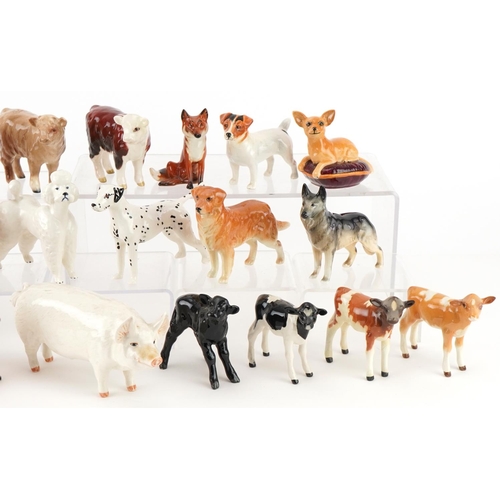 1054 - Collection of Beswick animals including cows, dogs and horses, the largest 17cm in length