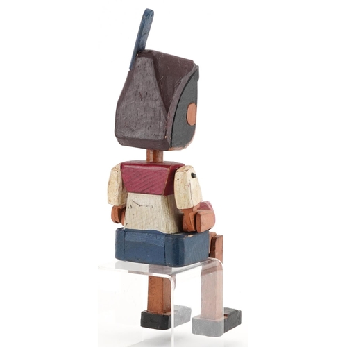 558 - Hand painted carved wood figure of Pinocchio with jointed arms and legs, 35cm high