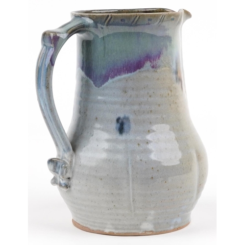 339 - Michael Leach, large Yelland studio pottery jug having a mottled purple-brown glaze, impressed marks... 