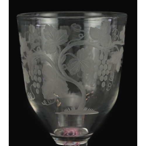 207 - 18th century wine glass with multi coloured opaque twist stem and bowl engraved with leaves and berr... 