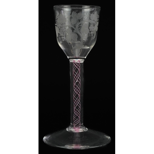 207 - 18th century wine glass with multi coloured opaque twist stem and bowl engraved with leaves and berr... 