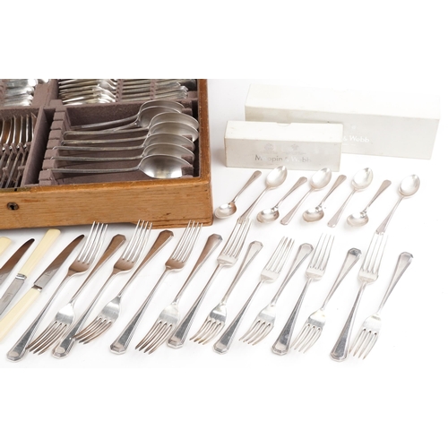 387 - Predominantly Mappin & Webb silver plated cutlery, some housed in an oak canteen