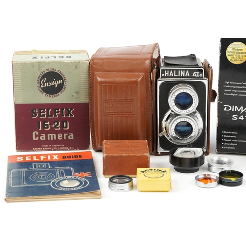 462 - Vintage and later cameras and accessories including Halina and Minolta Dimage S414