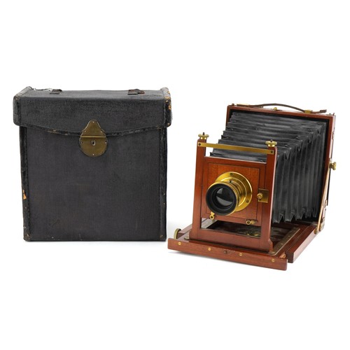 744 - Victorian London Stereoscopic & Co mahogany plate camera with a 7 x 5 brass lens, 21cm x 20cm