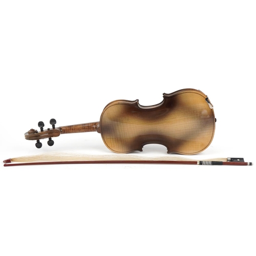 484 - Violin with Stradivarius paper label to inside, bow and hard case, the violin back 35cm in length