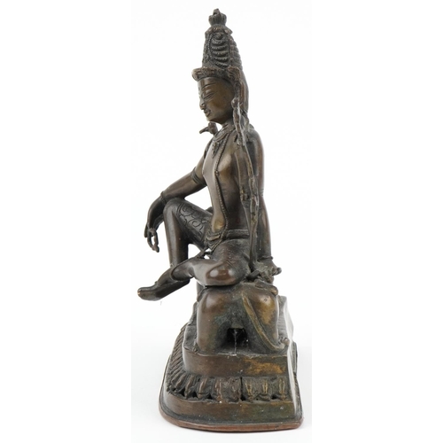 79 - Chino Tibetan bronze Buddha of Tara seated on a lion, 24cm high