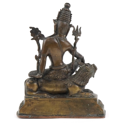 79 - Chino Tibetan bronze Buddha of Tara seated on a lion, 24cm high