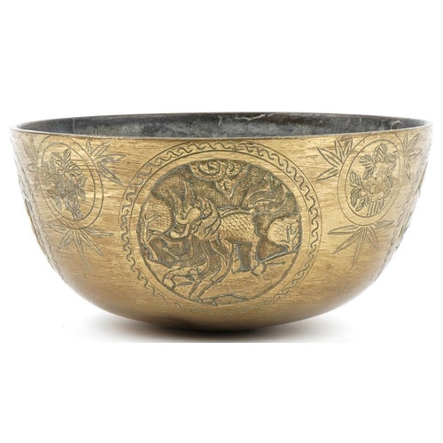 176 - Large Chinese bronze singing bowl decorated with panels of dogs of Foo, flowers and deer, character ... 