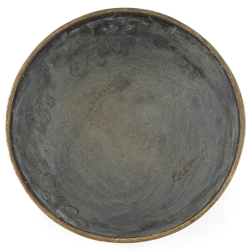 176 - Large Chinese bronze singing bowl decorated with panels of dogs of Foo, flowers and deer, character ... 