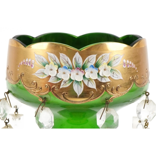 202 - Victorian green glass lustre hand enamelled and gilded with flowers, 42cms high