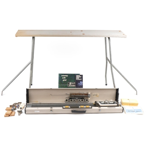 1164 - Knitmaster knitting machine on stand, model number 299638 together with a large collection of mostly... 