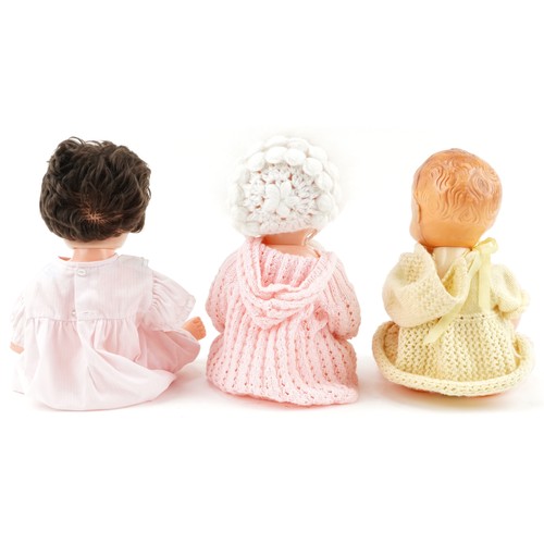 580 - Three vintage composite dolls with jointed limbs and open close eyes, the largest 50cm high