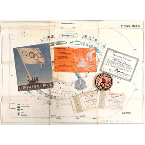 The Berlin 1936 Olympic memorabilia including Official Handbook, patch badge, tickets for 12th August and Olympic map